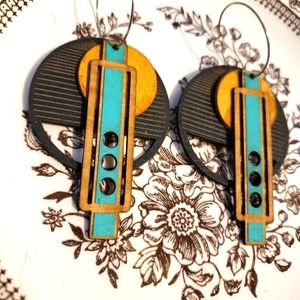 Gorgeous laser cut wood and leather earrings